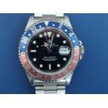 A boxed 1990 gent's stainless steel Rolex Oyster Perpetual Date GMT-Master automatic wrist watch