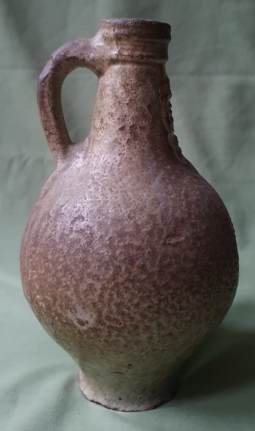 A 17thC bellarmine pottery jug of small proportions, 8.5" high. - Image 2 of 5