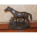 A 20thC equestrian bronze after Mene, 15" across - a/f.