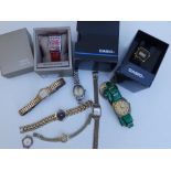 A lady's 9ct wrist watch and 10 modern wrist watches. (11).