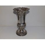 A late Victorian crested silver pedestal vase with embossed decoration, Sheffield 1896, 9" high.