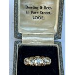 A late Victorian five stone graduated old cut diamond ring, the central stone weighing approximately