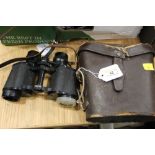 Two pairs of binoculars,