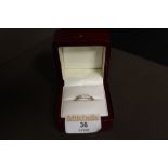 18 ct gold four stone ring,