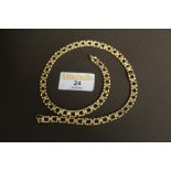 9 ct gold link chain, weight 18.