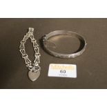 2 silver bracelets - one with padlock pendant weight 32 grams etc