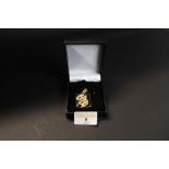 Small silver gilt dragon design pendant (AF)