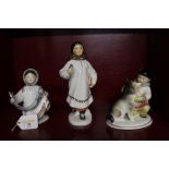 Three figural porcelain ornaments stamped to base made in USSR