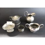 Silver and white metal condiments - milk jug,