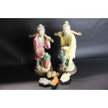 Pair of Japanese porcelain figures of farmer and fisherman