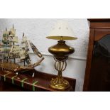 Gilt coloured designer lamp and shade