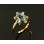 An aquamarine and diamond ring, 18 ct gold. Size O. 3.5 grams.
