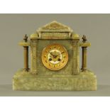 A late 19th century onyx cased mantle clock, with two train striking movement.