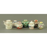 A collection of six miscellaneous lidded ginger jars, together with a teapot.