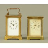 An antique brass carriage clock, timepiece only and another.