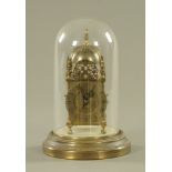 An early 20th century small reproduction lantern clock, housed under a glass dome.
