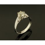 An 18 ct white gold solitaire diamond ring, with diamond weighing +/- 1 carat.