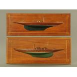 A pair of early 20th century ship part hull models, each on mahogany panel. 50 cm x 17.