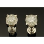 A pair of 18 ct white gold stud earrings, set with diamonds weighting +/- 3.01 carats.