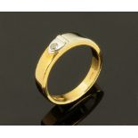 An 18 ct gold two tone diamond set belt ring.