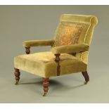 A late Victorian armchair, upholstered in green velvet type material and turkey patterned panels.