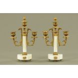 A pair of late Victorian two branch candlesticks, metal and white marble. Height 28 cm.