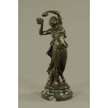 After Claude Michel Clodion (French 1738-1814), a patinated bronze maiden,