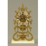 A brass single fusee skeleton clock, raised on a marble plinth. Height 36 cm, width 20 cm.