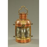 A Victorian copper and brass mast head ships lantern. Height +/- 56 cm (see illustration).