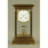 A brass cased four glass mantle clock,