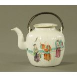 A Chinese porcelain cylindrical teapot, with ribbed sides and floral decoration. Height 10 cm.