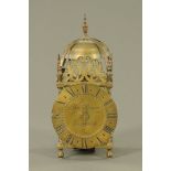 A Reproduction brass lantern clock by Thomas Moore Ipswich. Height 38 cm, dial diameter 17 cm.
