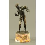 An early 20th century bronze figure, possibly Hercules,