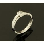 An 18 ct white gold solitaire diamond rubover set ring, with princess cut diamond weighing +/- .