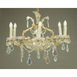 A Venetian glass chandelier type light fitting, with faceted glass drops, six branch.