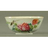 A Chinese Republic porcelain bowl decorated with flowers, birds and calligraphy. Diameter 11.5 cm.