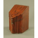 A George III mahogany serpentine fronted knife box,