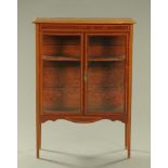 An Edwardian inlaid mahogany display cabinet,