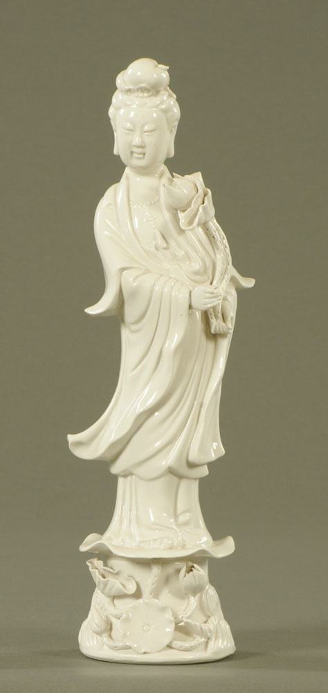 A Chinese blanc de chine figure of Guan Yin. Height 30 cm.