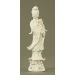 A Chinese blanc de chine figure of Guan Yin. Height 30 cm.
