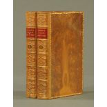 Homers Iliad volumes 1 & 2, leather bound.