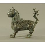 A Persian bronze incense burner in the form of a mythical creature, probably 18th century.