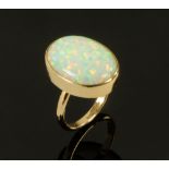 A large 9 ct gold opal ring, fully hallmarked.