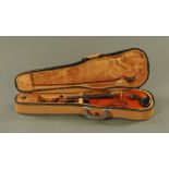 A 19th century three quarter size violin "Stradivarius" model within modern case and mother of