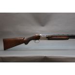 Winchester Super Grade 12 bore over/under shotgun, with 28" barrels, improved and cylinder choke,