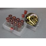 Sixteen 9 mm Rimfire cartridges, together with 9 12 bore snap caps and two 20 bore snap caps.