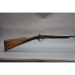 A Belgian 410 single barrelled shotgun, with a 29 1/2" barrel, cylinder choke, 2 1/2" chamber,