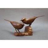 Ron Dickens a carved figure of two wagtails, signed to the bottom and dated 1973.