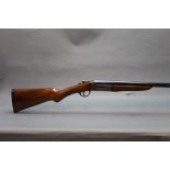 A Webley 12 bore single barrelled shotgun, with a 32" barrel, half choke, 2 3/4" chamber,