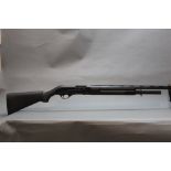 A Hatsan Escort Magnum 20 bore semi automatic shotgun (6 shot),